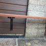 Wall mounted outdoor plastic composite bench with a rust resistant frame Image 4