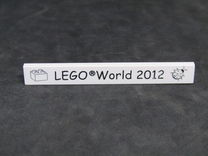 Lego World Fair Promotion Tile from Denmark 2012 A Rare Promotion Tile From Private Collection Collected At The Lego World Fair in Bella Center Copenhagen Denmark February 2012 RARE AND HARD TO FIND
