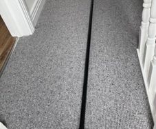 Black metal curtain rod with decorative ends