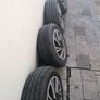 Set of 13 Inch Steel Wheels with Sporty Wheel Covers and Very Good Tyres Image 2