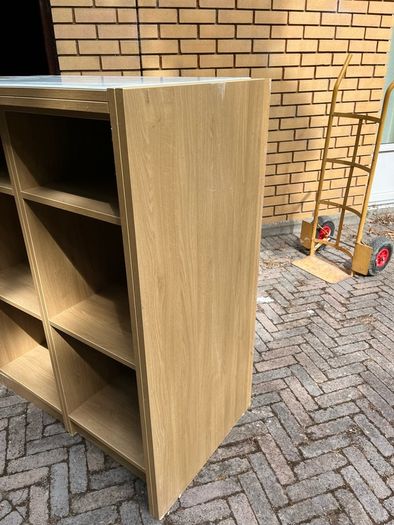 Veneered oak shelving unit with glass top