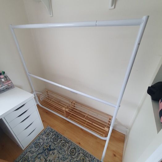Two Clothes Rails and Four Wooden Shoe Racks