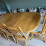 Solid wooden extendable table with 6 chairs Image 2