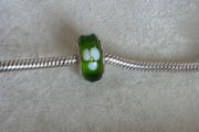 Pandora green glass charm with white flower design very good condition hallmarked