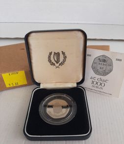 New 50p Millennium coin in original packaging