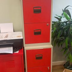 Red metal Ikea office cabinets