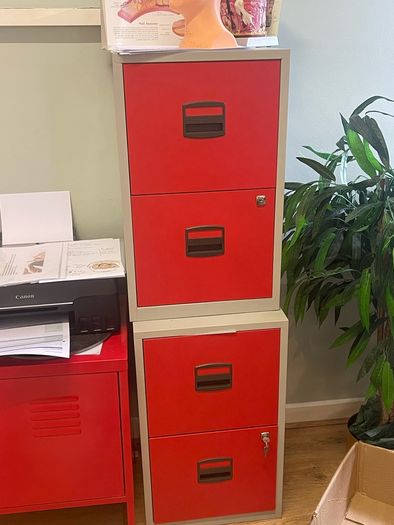 Red metal Ikea office cabinets