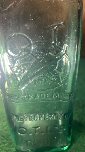 Aqua green Australian chili bottle , 1910