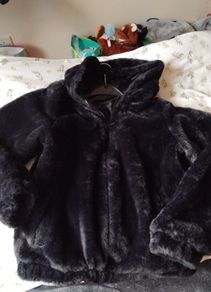 Black fur jacket with hood age 11-12