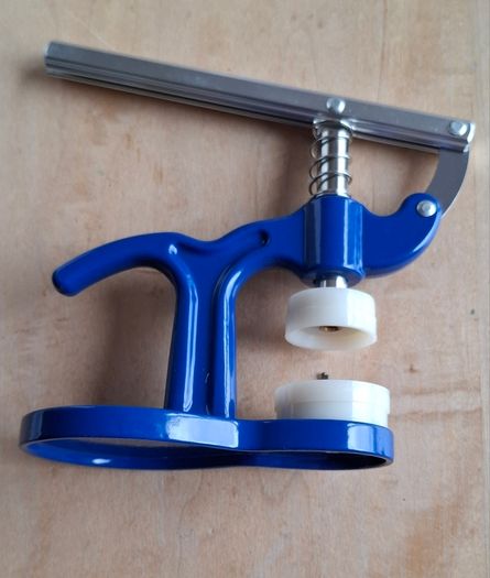 Watch back press