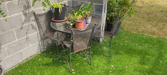 Wrought iron garden table and chairs