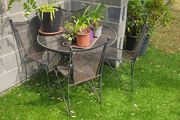 Wrought iron garden table and chairs