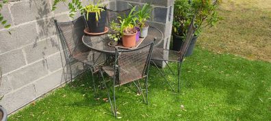 Wrought iron garden table and chairs