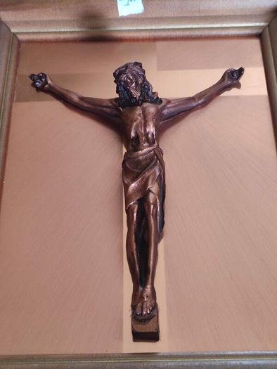 Framed copper crucifix - the copper figure of Christ, set against a copper mount,