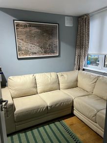Cream leather corner sofa with right facing chaise