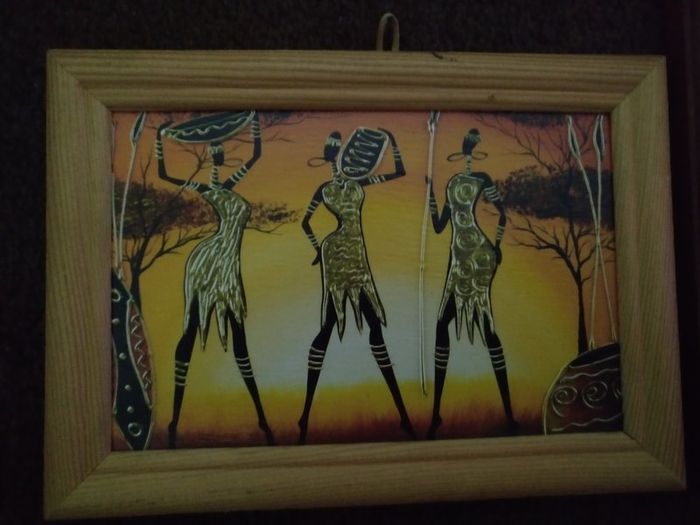 3 pictures in frames