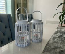 Lanterns, for candles. Gorgeous white wicker. 2 for sale