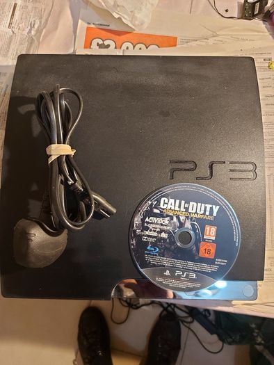 SONY Playstation 3, Model CECH-2503A, comes with Power Cable, 1 Controller, Call of Duty Game, Powers on and off, and takes in and ejects disks