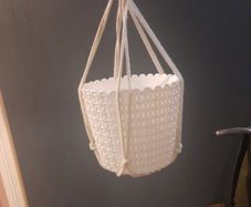 white woven basket effect plant pot