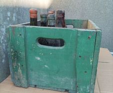 Vintage wood box, Portugal with 8 bottles with content, for display only