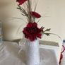 A collection of Artificial Flowers . Image 9
