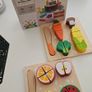 Wooden vegetables and cake Image 6