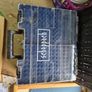 brand new cordless drill with 2 batteries, a charger, and carry case. Image 6