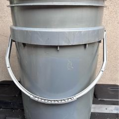 Tall grey plastic bucket