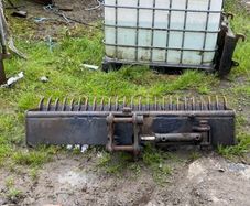 Tilt rake bucket