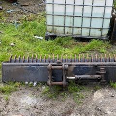 Tilt rake bucket