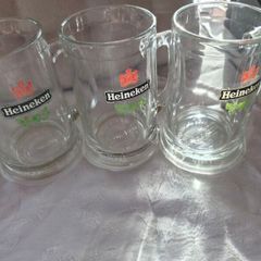 5 Vintage Heineken 1/2 pint, glass beer tankards/mugs.