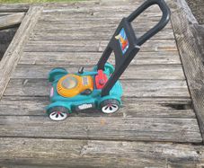 Little Tikes lawnmower with petrol can