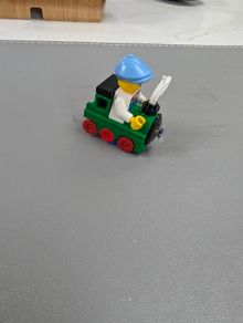 Lego figure in train costume