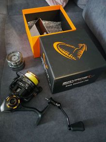 fishing reel with braid like new