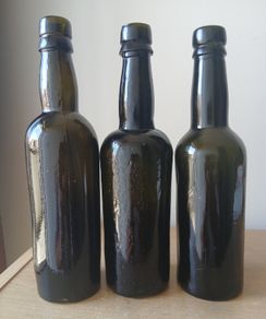 Lot of 3 vintage Guinness bottles