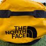 The Northface Duffel Large in Yellow & Black. Image 4
