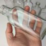193 - Set of 7 Vintage Clear Glass Collectible Decorative Bottles Image 2