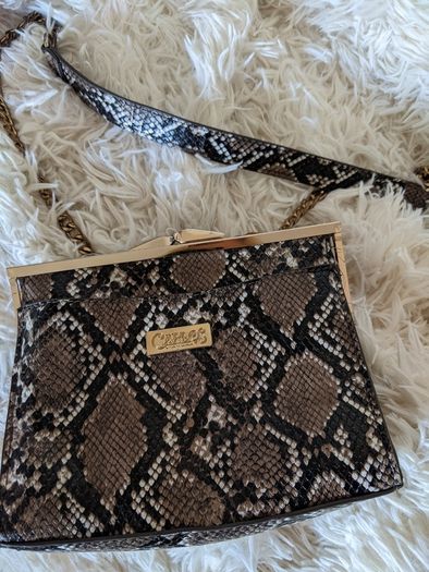 Handbag by Carlos Santana