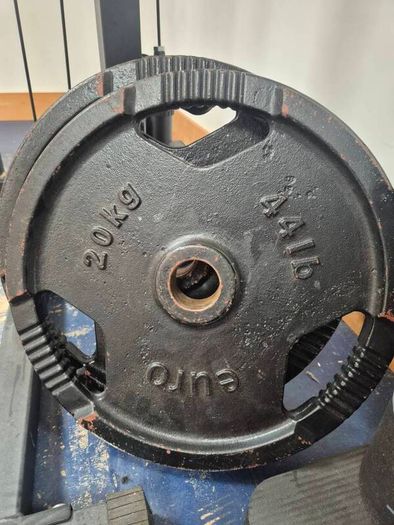 Home Gym set up w/ plates and kettlebells