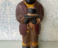 Original Cast Iron Uncle Moses Money box.