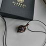 Handmade wire wrapping copper pendant with amethyst. NEW Alabama Studio Image 5