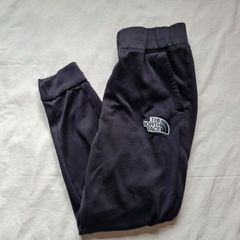 The North face thick polyester bottoms Size small 28" leg black In excellent condition