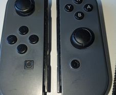 Pair of Official nintendo switch joy-con controllers -right one is faulty-drift