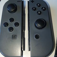 Pair of Official nintendo switch joy-con controllers -right one is faulty-drift