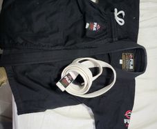 Kids 7-9 fuji ju jitsu gi used once...great thick quality