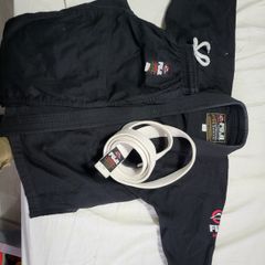 Kids 7-9 fuji ju jitsu gi used once...great thick quality