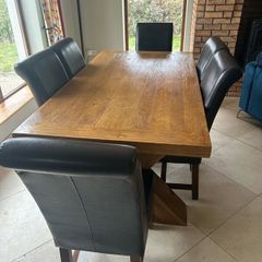 Oak Table and six chairs. 350
