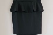Black faux leather peplum skirt (knee length)
