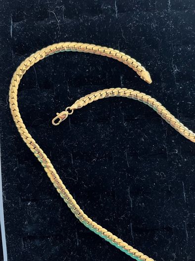 Gold tone JJ necklace