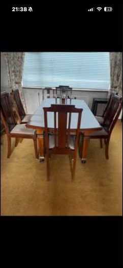 Beautiful antique mahogany dining table and chairs